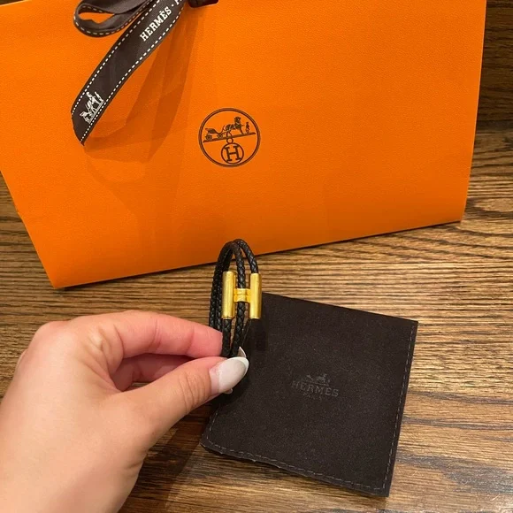 Authentic Hermes’ men’s Tournis Tresse bracelet in black leather gold hardware - Picture 2 of 5